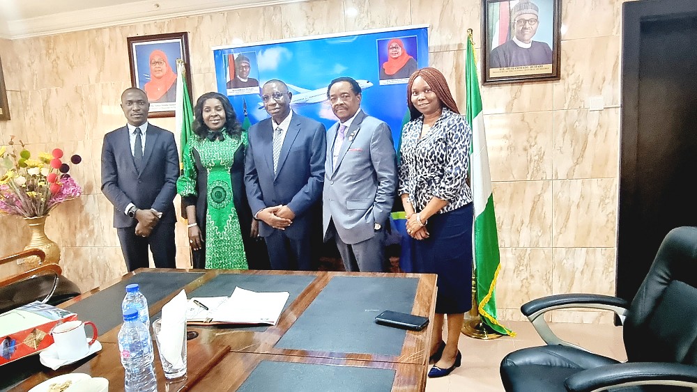 H. E. Dr. Benson Alfred Bana, flaged by Asiwaju (Dr.) Michael Olawale-Cole, CON, the Director General, Dr. Chinyere Almona, Mr Philbert Peter and Mrs Edna Obinyan Sylvester.