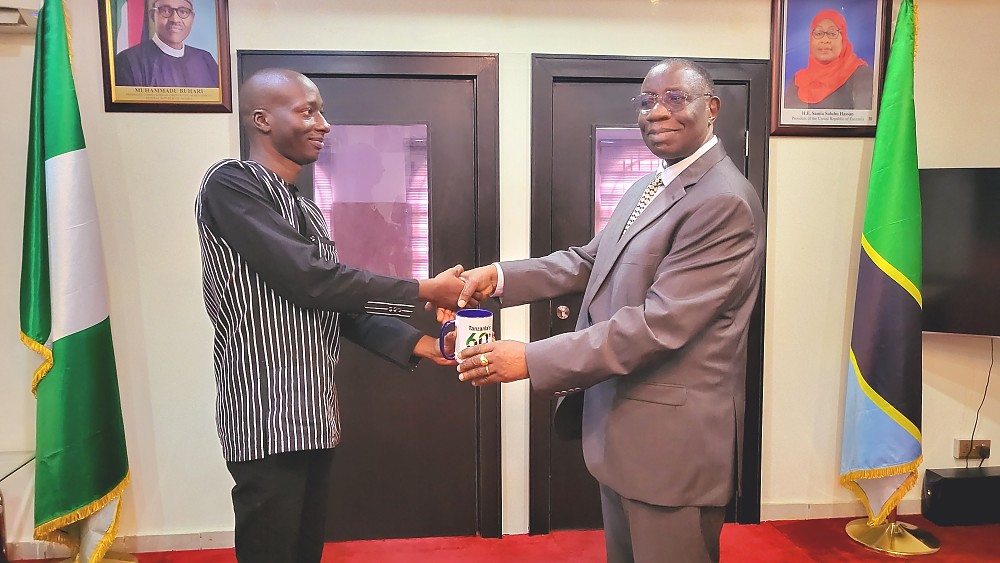 H. E. Dr. Benson Alfred Bana, and Mr. Bertrand Tiemtore