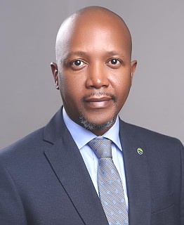 Mr. Allen Fanuel Kuzilwa - Minister Plenipotentiary