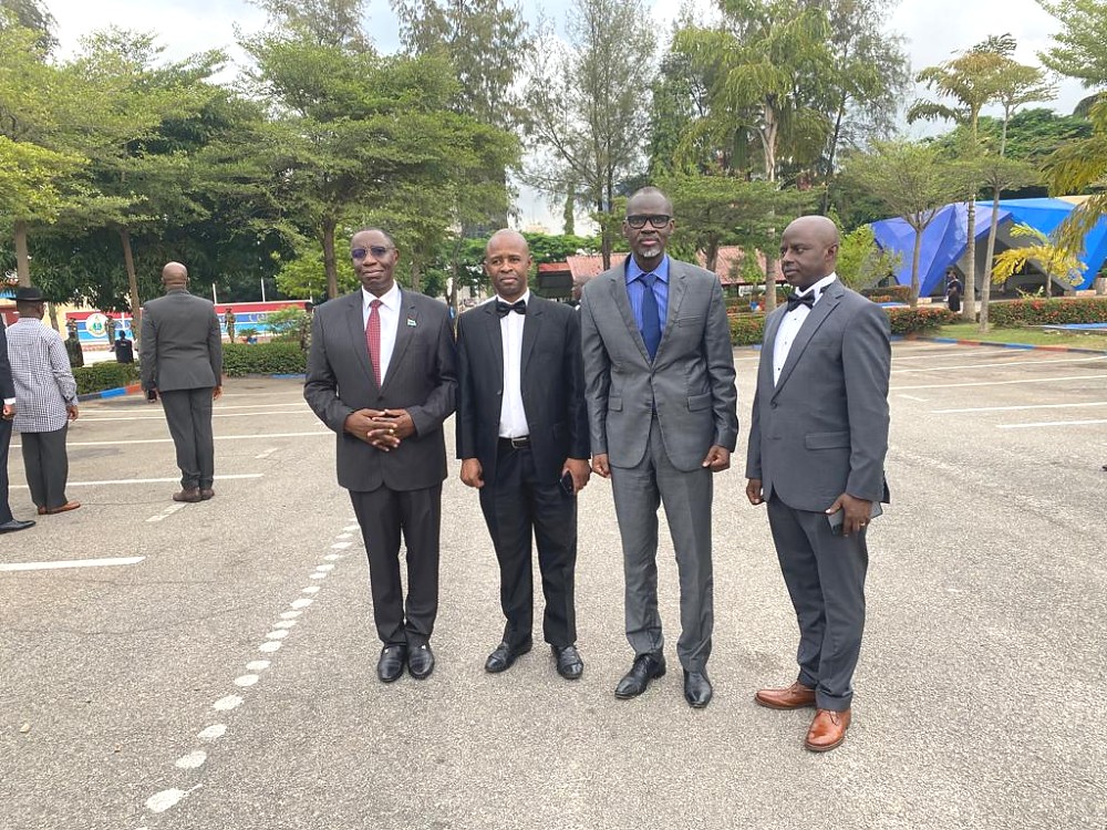 H. E. Dr. Benson Alfred Bana, H. E. Stanislas Kamanzi, High Commissioner of Rwanda, Col Kasyupa and another course participant.